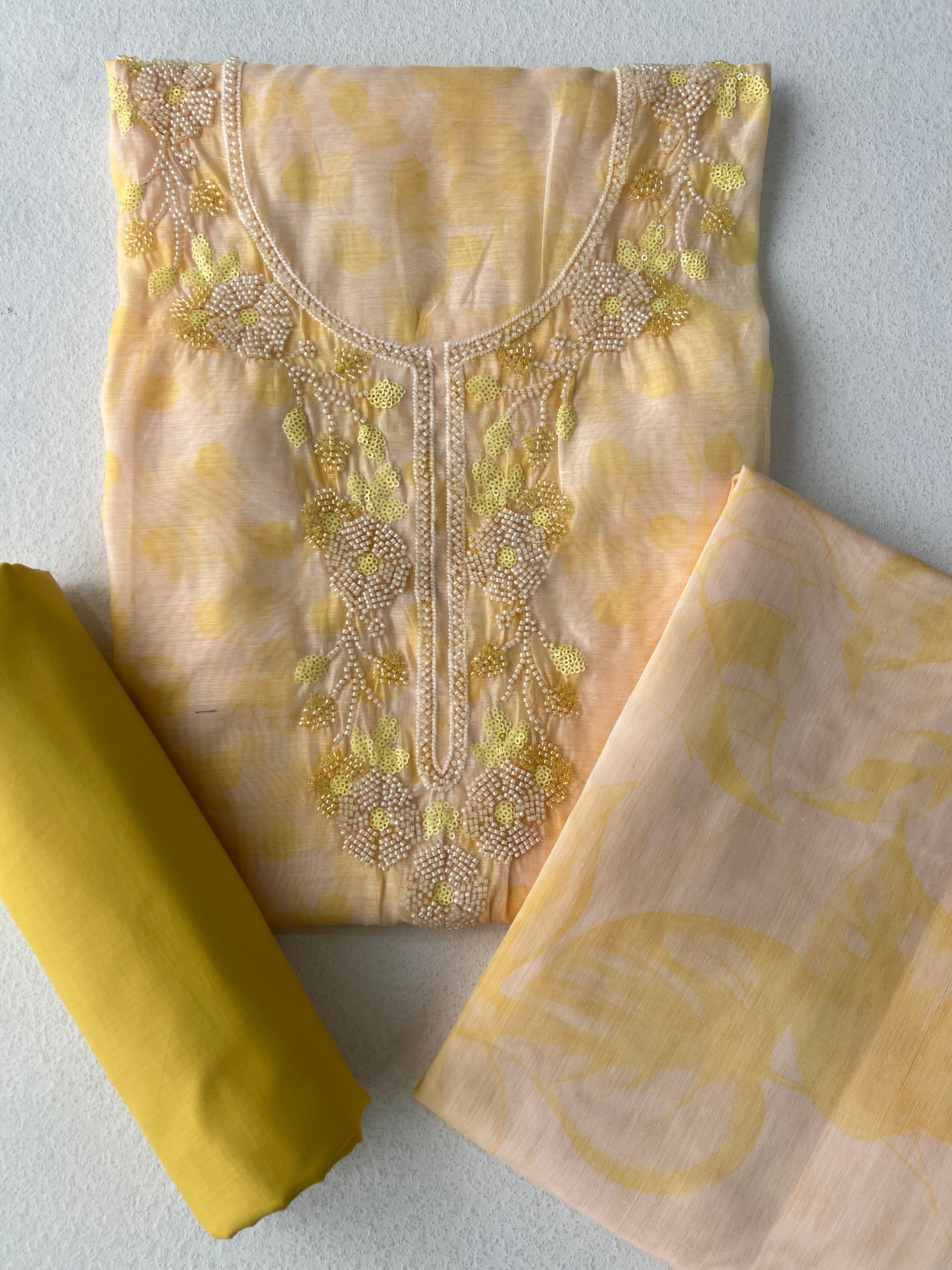 YELLOW ORGANZA UNSTITCHED SUITS