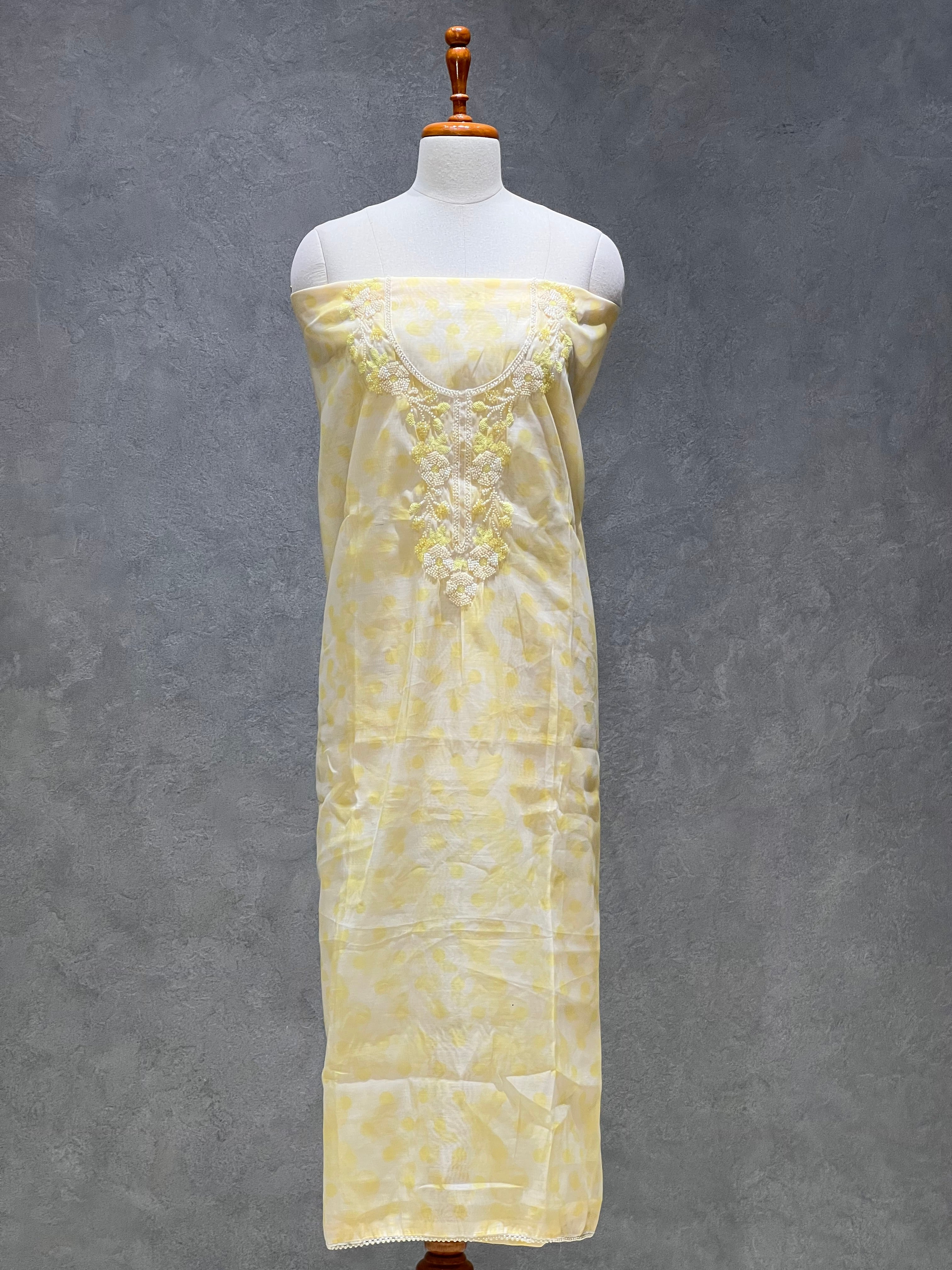 YELLOW ORGANZA UNSTITCHED SUITS