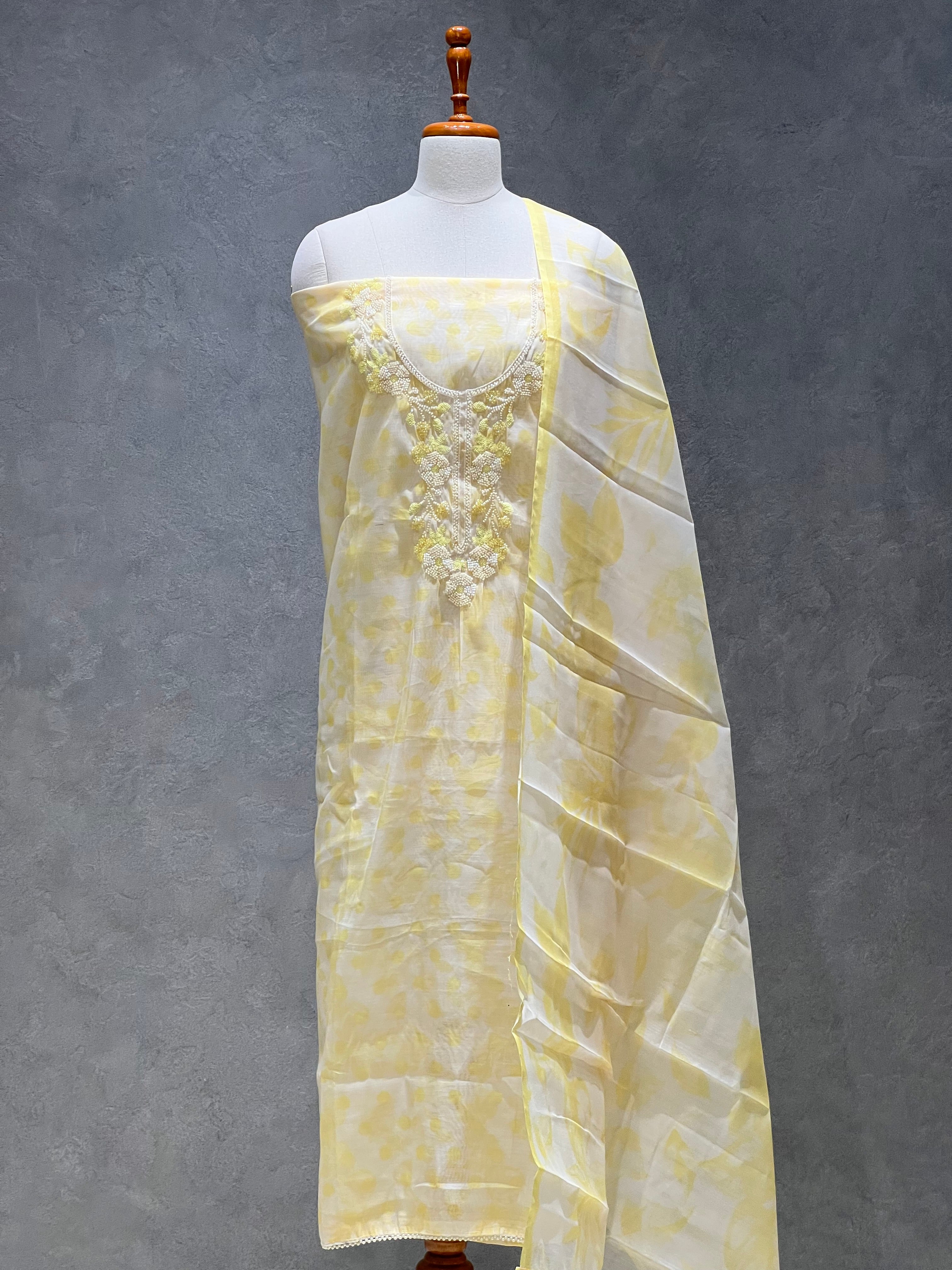 YELLOW ORGANZA UNSTITCHED SUITS